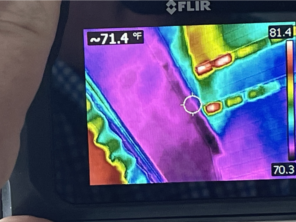 Simplified Construction FLIR camera showing cooling loss in a bedroom ceiling